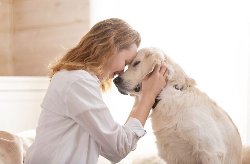 Woman embraces her new dog amid first day challenges.